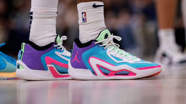 Jayson Tatum's blue and pink Jordan Brand sneakers.