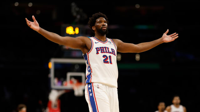 Philadelphia 76ers center Joel Embiid (21) celebrates after scoring his 50th point of the game against the Washington Wizards in the fourth quarter at Capital One Arena.