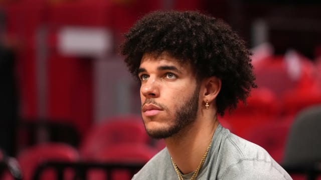 Dec 11, 2021; Miami, Florida, USA; Chicago Bulls guard Lonzo Ball sits court-side prior to the game against the Miami Heat