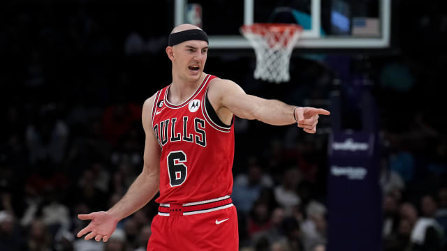 Mar 31, 2023; Charlotte, North Carolina, USA; Chicago Bulls guard Alex Caruso (6) reacts to a call in the first half against the Charlotte Hornets