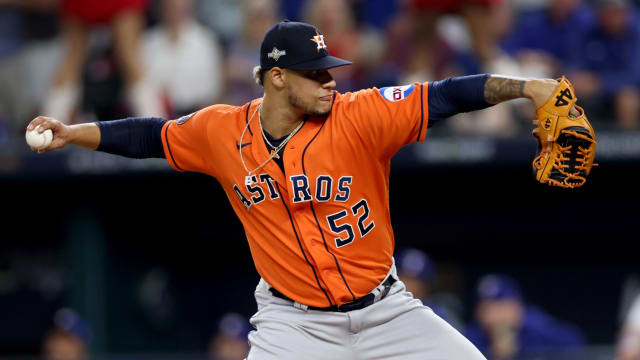 Oct 20, 2023; Arlington, Texas, USA; Houston Astros pitcher Bryan Abreu (52) throws during the eighth inning of game five in the ALCS against the Texas Rangers for the 2023 MLB playoffs at Globe Life Field. Mandatory Credit: Andrew Dieb-USA TODAY Sports  