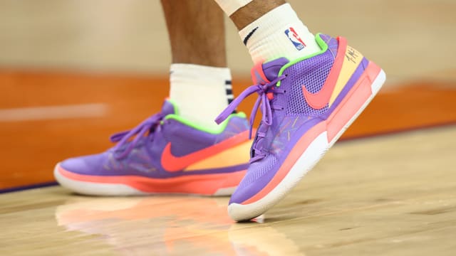 Memphis Grizzlies guard Ja Morant's purple and orange Nike sneakers.