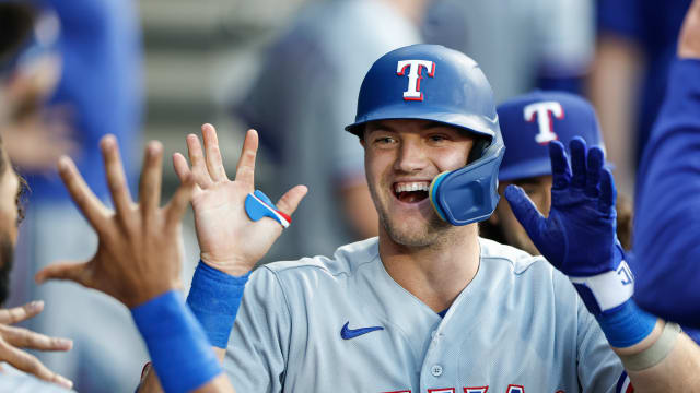Jun 19, 2023; Chicago, Illinois, USA; Texas Rangers third baseman Josh Jung (6) celebrates with teammates after hitting a solo home run against the Chicago White Sox during the third inning at Guaranteed Rate Field. Mandatory Credit: Kamil Krzaczynski-USA TODAY Sports