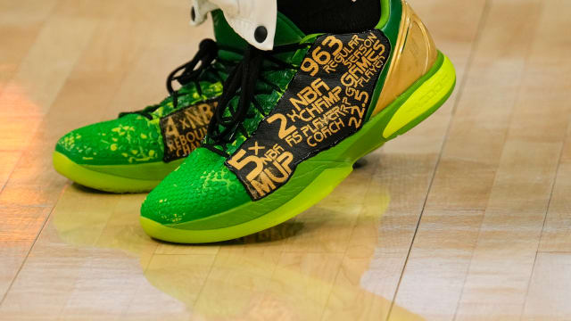 Boston Celtics guard Jaylen Brown's custom green Nike sneakers.