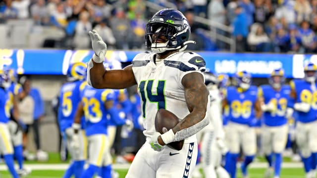 Seattle Seahawks wide receiver DK Metcalf (14) celebrates after a touchdown in the fourth quarter against the Los Angeles Rams at SoFi Stadium.