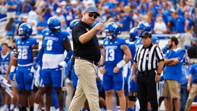 Mark StoopsKentucky Wildcats head coach Mark Stoops gives a thumbs up before the game against the Florida Gators at Kroger Field