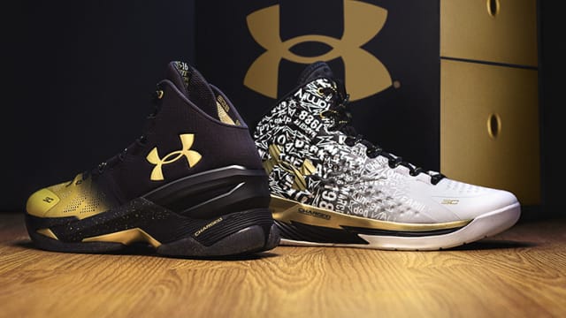 Side view of Stephen Curry's black and white Under Armour shoes.