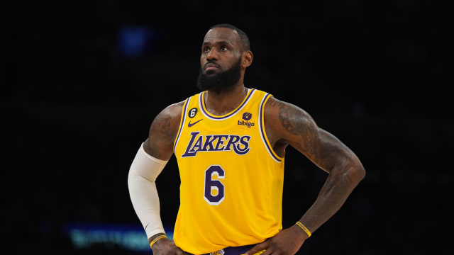 Los Angeles Lakers forward LeBron James looks on during a game.