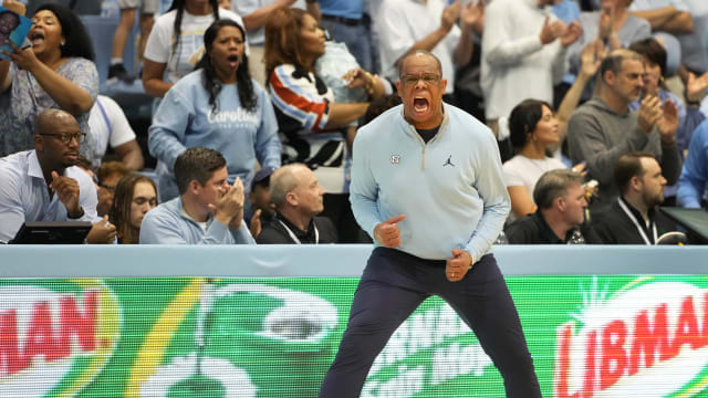 UNC basketball head coach Hubert Davis versus Duke