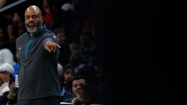 Washington Wizards head coach Wes Unseld Jr. gestures from the bench against the Orlando Magic in the second quarter at Capital One Arena.