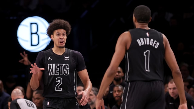 Brooklyn Nets forward Cameron Johnson (2) celebrates his three point shot against the Washington Wizards with forward Mikal Bridges (1) during the third quarter at Barclays Center. 