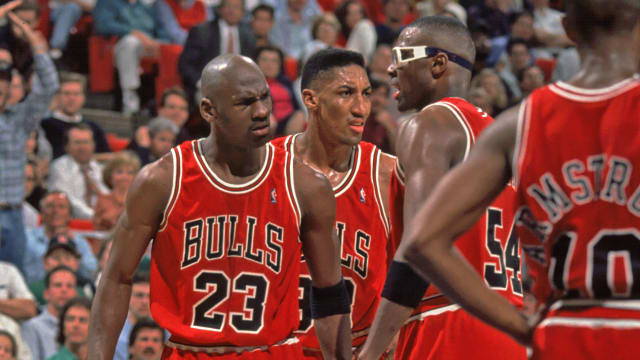 Chicago Bulls' Michael Jordan, Scottie Pippen, and Horace Grant during the game against the Orlando Magic at the Orlando Arena.