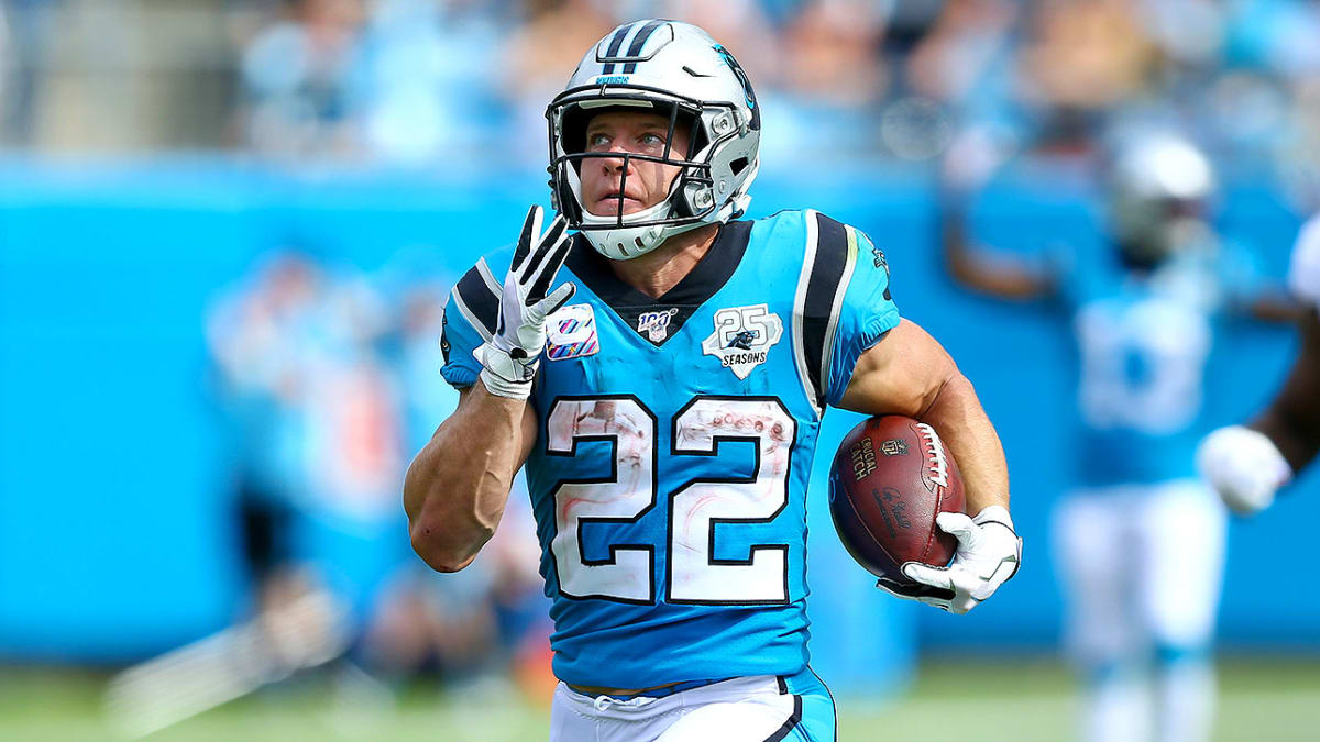 McCaffery running with the ball in his hand.