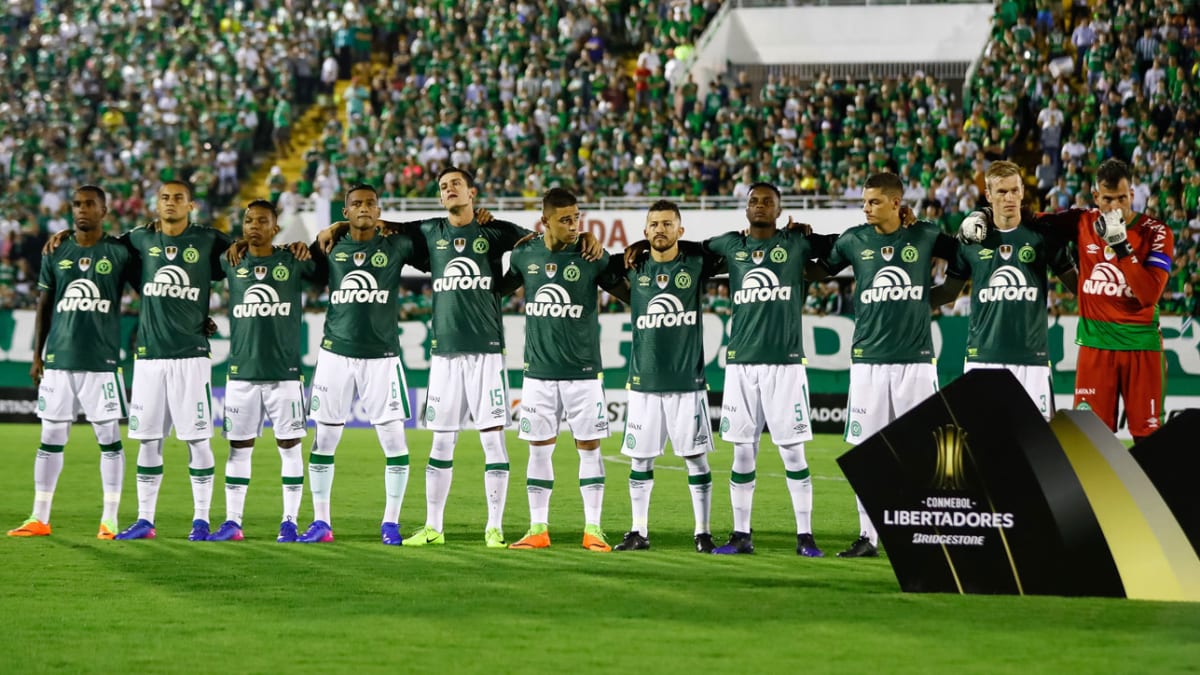 Fans of Atletico Nacional celebrate at the end of a second leg