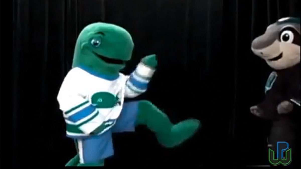 Former AHL mascot Pucky the Whale does the sprinkler in dance off