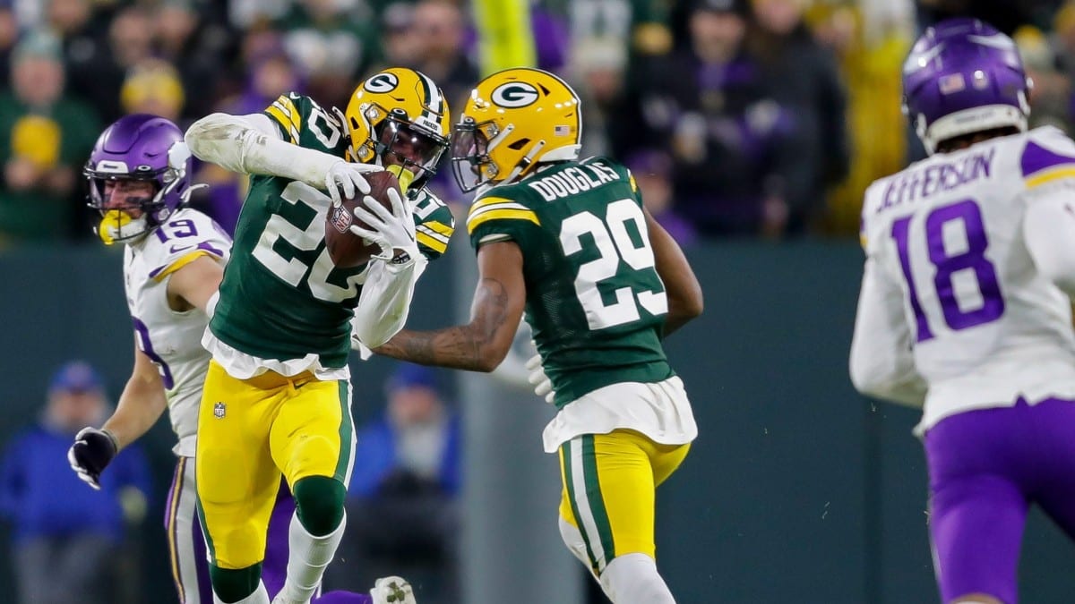 Green Bay Packers safety Rudy Ford (20) intercepts a pas intended for Minnesota Vikings wide receiver Adam Thielen (19) in the fourth quarter during their football game Sunday, January 1, 2023, at Lambeau Field in Green Bay, Wis. Dan Powers/USA TODAY NETWORK-Wisconsin