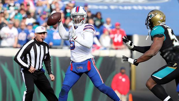 Taylor (in white) helped the Bills end their 17-year playoff drought in 2017.