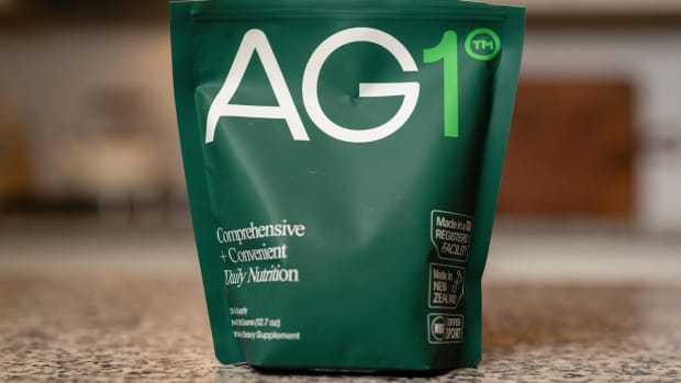 AG1 is a greens powder containing vitamins, minerals, superfoods, antioxidants, enzymes, therapeutic mushrooms, prebiotics and probiotics.