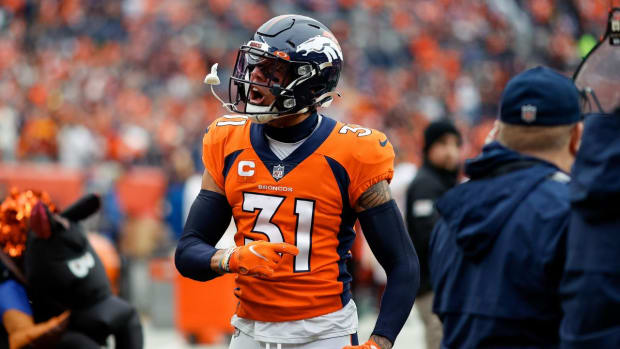 Denver Broncos safety Justin Simmons (31) reacts after a play in the first quarter against the Washington Football Team at Empower Field at Mile High.