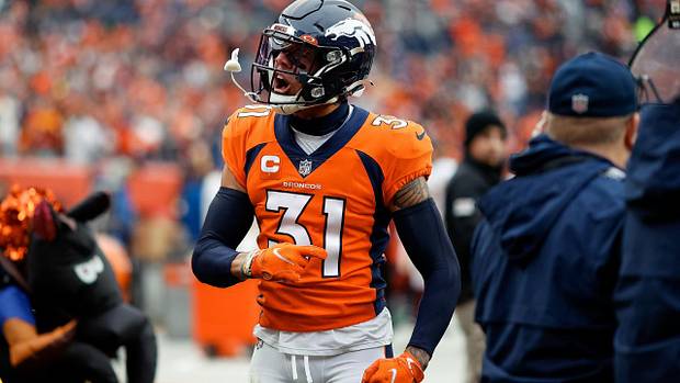 Denver Broncos safety Justin Simmons (31) reacts after a play in the first quarter against the Washington Football Team at Empower Field at Mile High.
