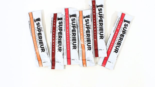 Superieur electrolyte travel packets in various flavors against a white background