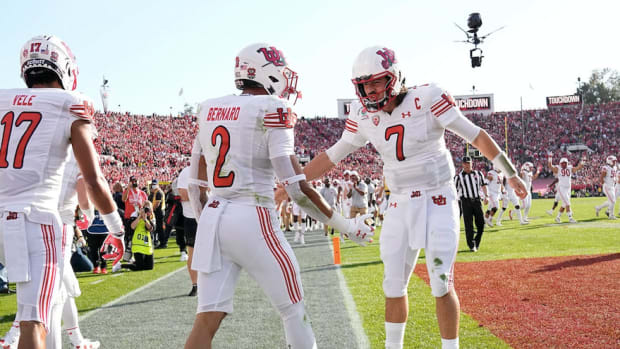 Utah Utes running back Micah Bernard (2) celebrates a touchdown with quarterback Cameron Rising (7) and wide receiver Devaughn Vele (17) during the first quarter of the Rose Bowl in Pasadena, Calif. on Jan. 1, 2022. College Football Rose Bowl.