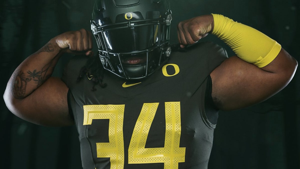 Oregon Ducks Team-Issued #52 Black Mighty Oregon Jersey from the