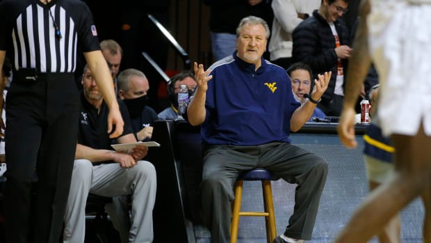 West Virginia coach Bob Huggins gestures during an NCAA college men's basketball game between the West Virginia Mountaineers and the Oklahoma State University Cowboys (OSU) at Gallagher-Iba Arena in Stillwater, Saturday, Feb. 12, 2022. Osu West Virginia