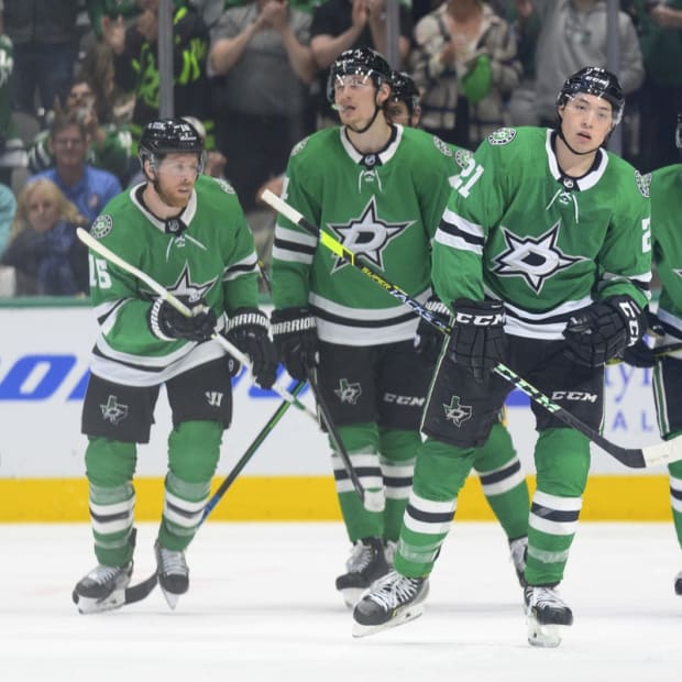 Apr 29, 2022; Dallas, Texas, USA; Dallas Stars center Joe Pavelski (16) and center Roope Hintz (24) and left wing Jason Robertson (21) and defenseman Miro Heiskanen (4) skate off the ice after Robertson scores the game winning goal against the Anaheim Ducks during the third period at the American Airlines Center. Mandatory Credit: Jerome Miron-USA TODAY Sports