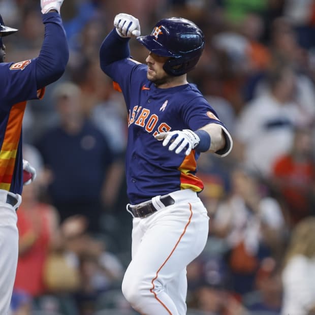 May 8, 2022; Houston, Texas, USA; Houston Astros third baseman Alex Bregman (2) celebrates with designated hitter Yordan Alvarez (44) after hitting a home run during the fifth inning against the Detroit Tigers at Minute Maid Park. Mandatory Credit: Troy Taormina-USA TODAY Sports