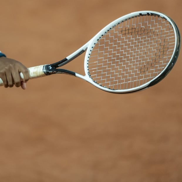 Sep 27, 2020; Paris, France; Cori Gauff (USA) reaches for the ball prior to her serve during her match against Johanna Konta (GBR) on day one at Stade Roland Garros. Mandatory Credit: Susan Mullane-USA TODAY Sports