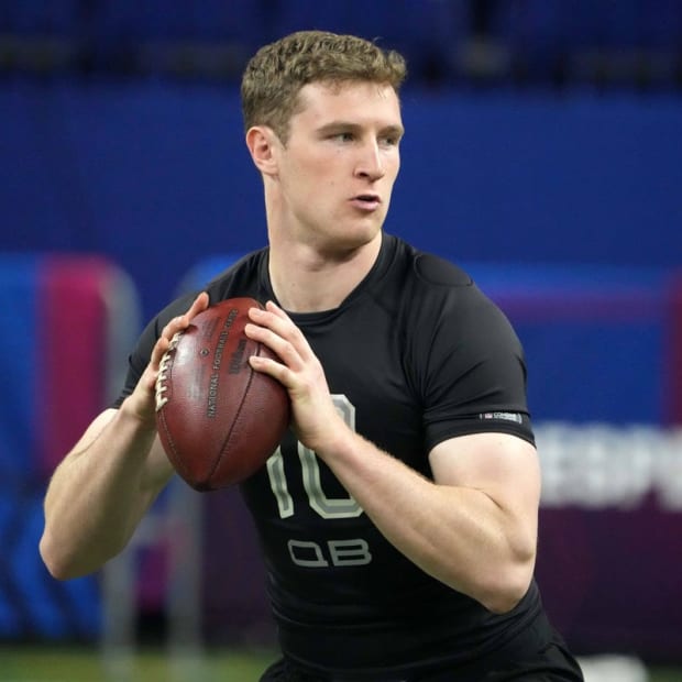 Mar 4, 2022; Indianapolis, IN, USA; Brown Bears quarterback E J Perry (EJ Perry) throws the ball during the 2022 NFL Scouting Combine at Lucas Oil Stadium. Mandatory Credit: Kirby Lee-USA TODAY Sports