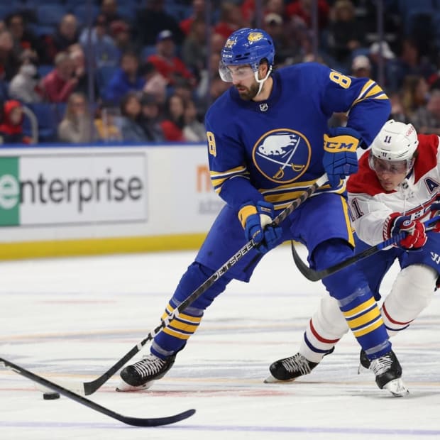 Oct 27, 2022; Buffalo, New York, USA; Montreal Canadiens right wing Brendan Gallagher (11) defends as Buffalo Sabres right wing Alex Tuch (89) controls the puck during the second period at KeyBank Center. Mandatory Credit: Timothy T. Ludwig-USA TODAY Sports