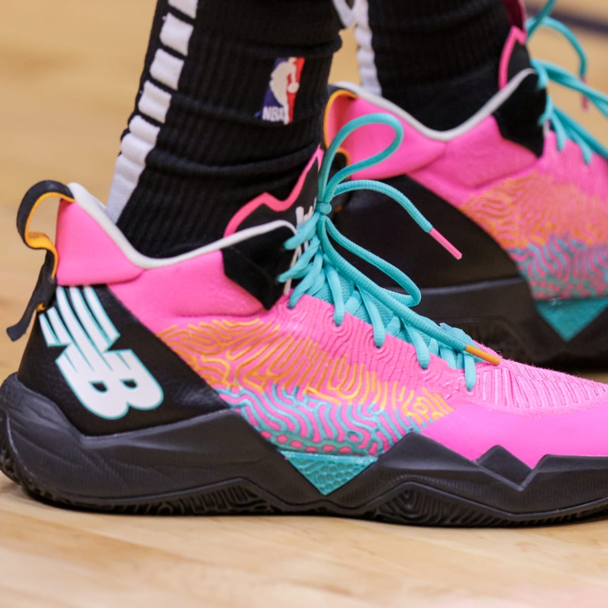 A detailed view of the shoes worn by San Antonio Spurs guard Romeo