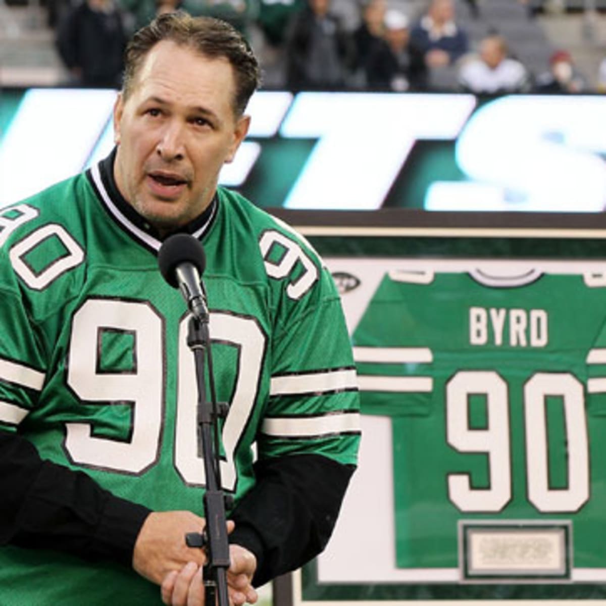 Dennis Byrd of the New York Jets looks on while there's a break in