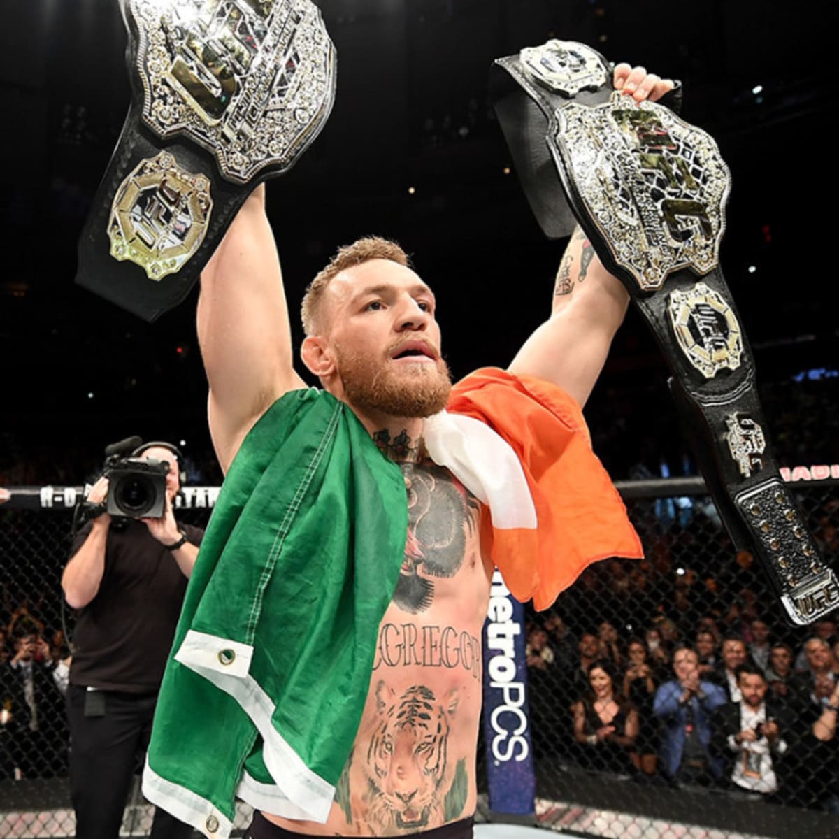 conor mcgregor double belts