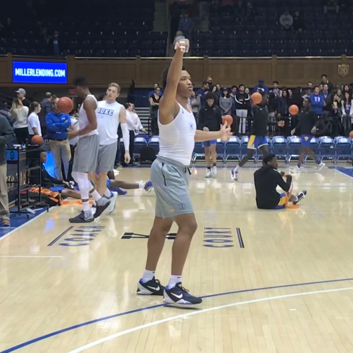 Duke players warm up at the beginning of practice at the NCAA men's college  basketball tournament, in Omaha, Neb., Thursday, March 22, 2018. Duke faces  Syracuse in a regional semifinal on Friday. (