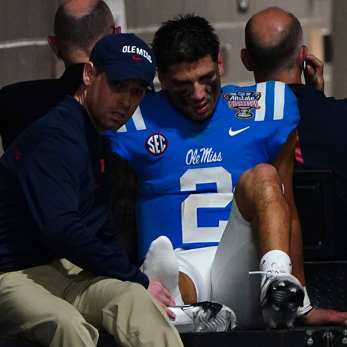 Matt Corral injury: Ole Miss quarterback carted off field after hurting leg  vs. Baylor - Sports Illustrated