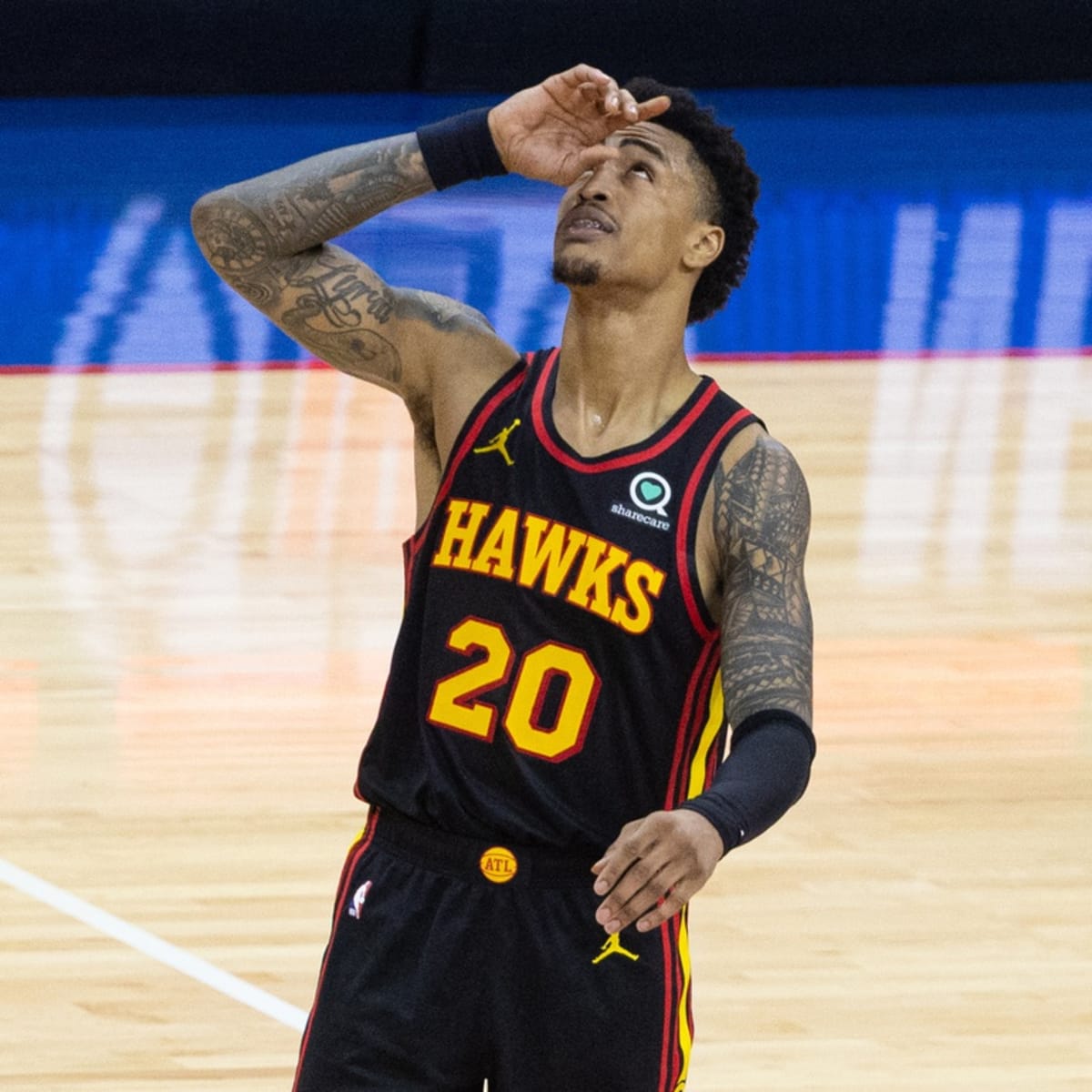 Hawks big man John Collins is grateful for the sacrifices of his military  mom - Sports Illustrated