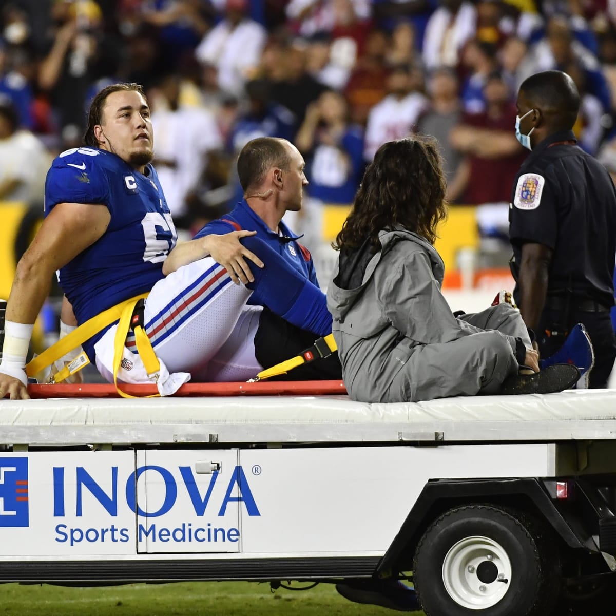 Giants' Gates carted off with broken leg against Washington