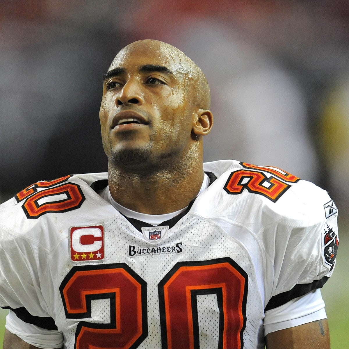 Former University of Virginia twin football stars Tiki Barber