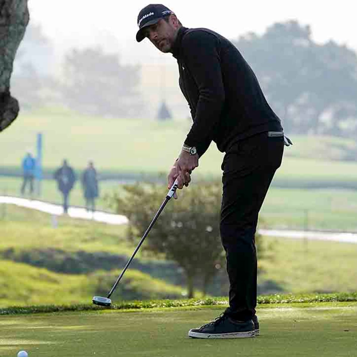 Aaron Rodgers wins a title this year, at the ATandT Pebble Beach Pro-Am