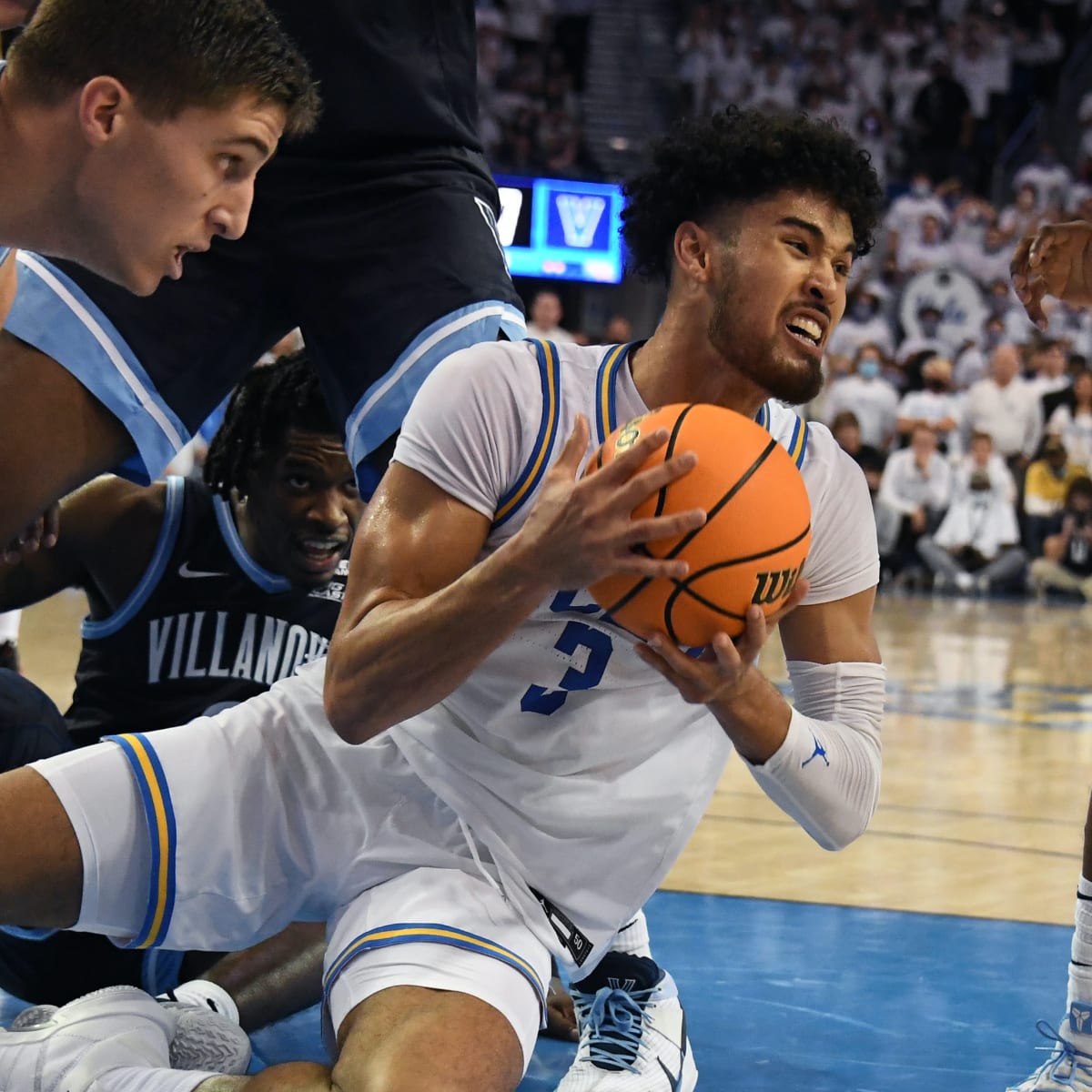 UCLA's Johnny Juzang declares for NBA Draft – while keeping his options  open