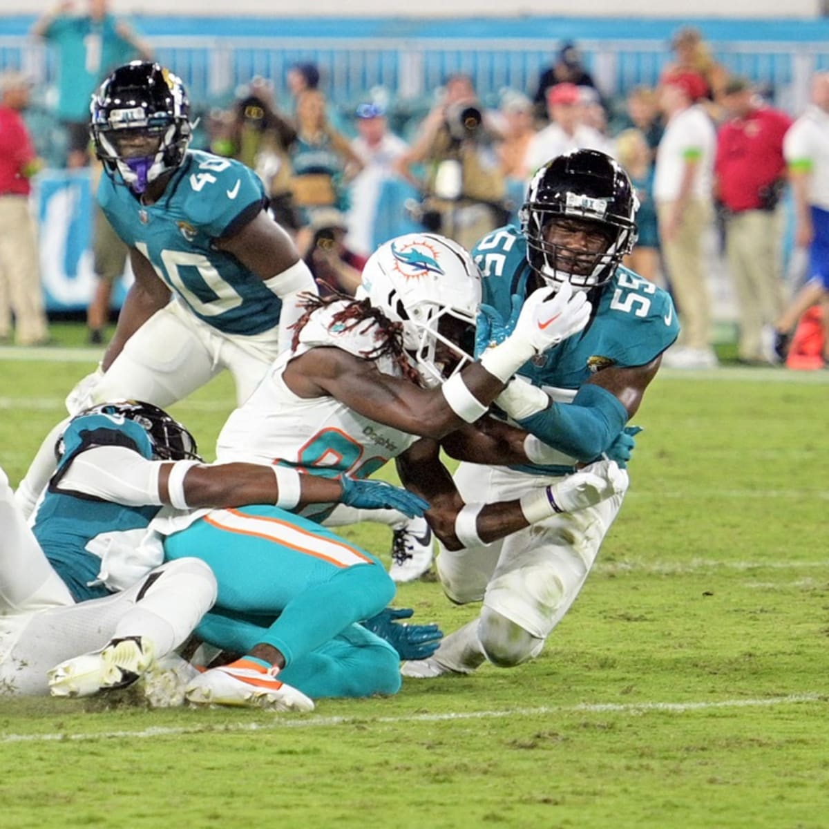 Dolphins' Tua gets two preseason drives; Daewood Davis injured