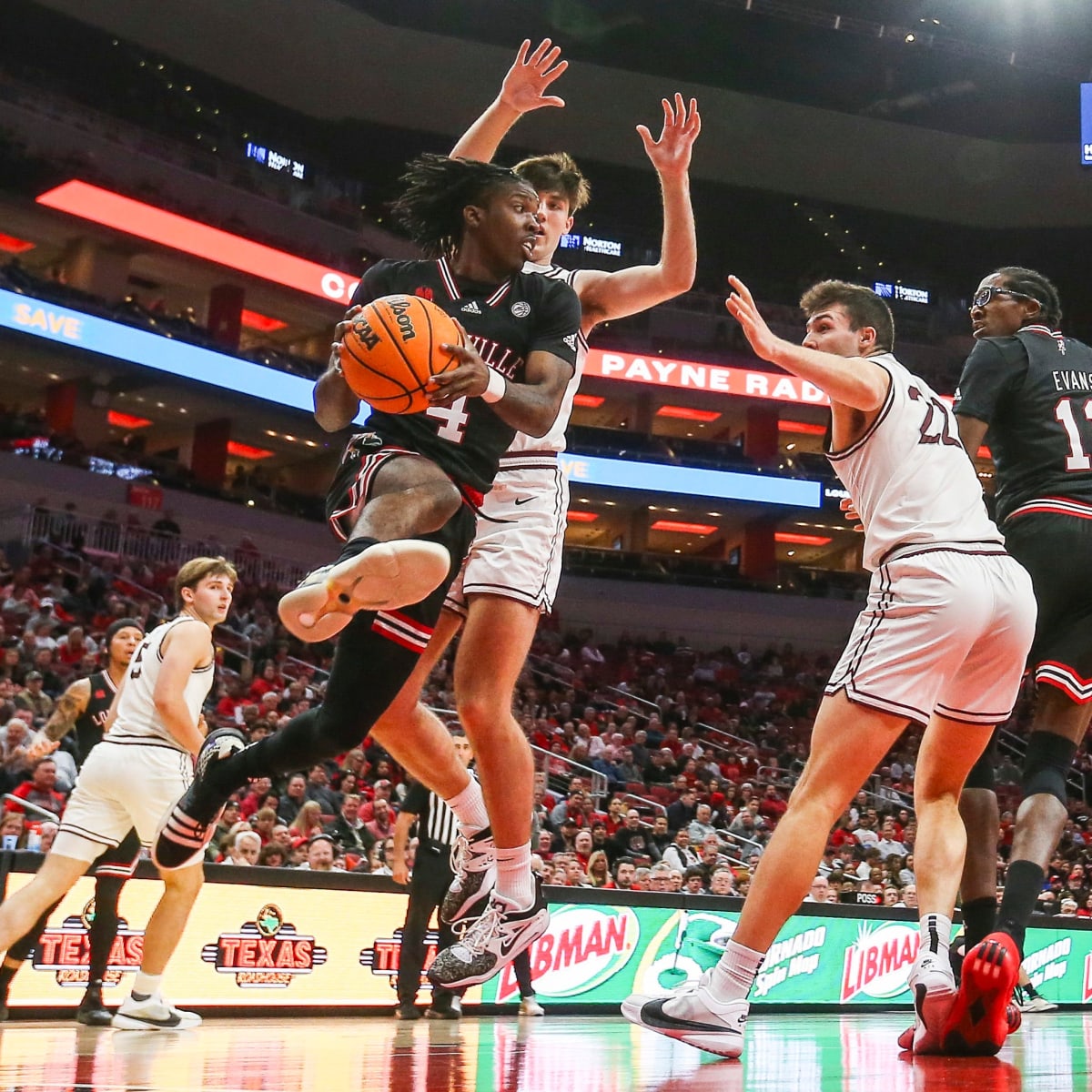Louisville's Ty-Laur Johnson Misses Huge Chunk of Game Due to