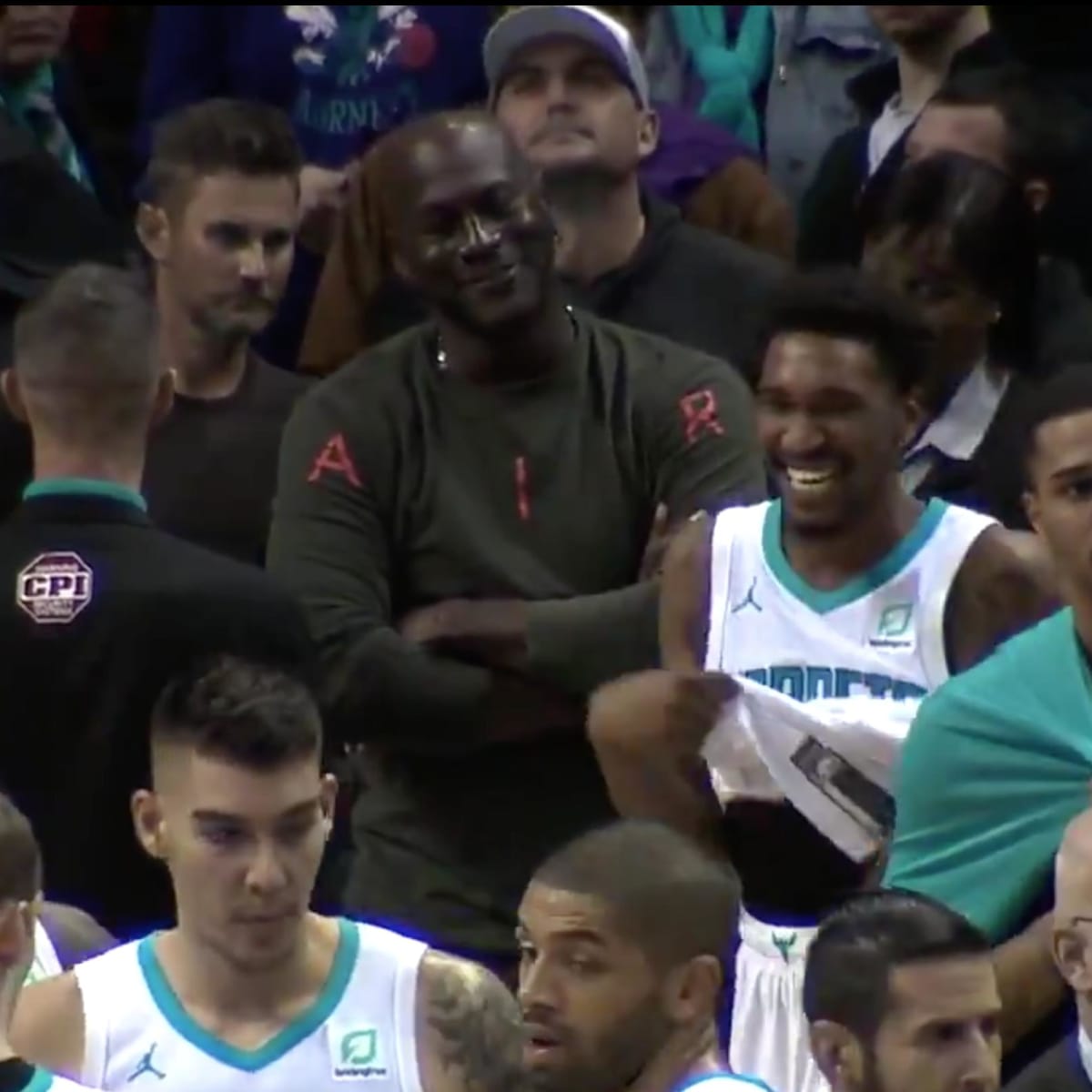 Michael Jordan slaps Hornets G Malik 