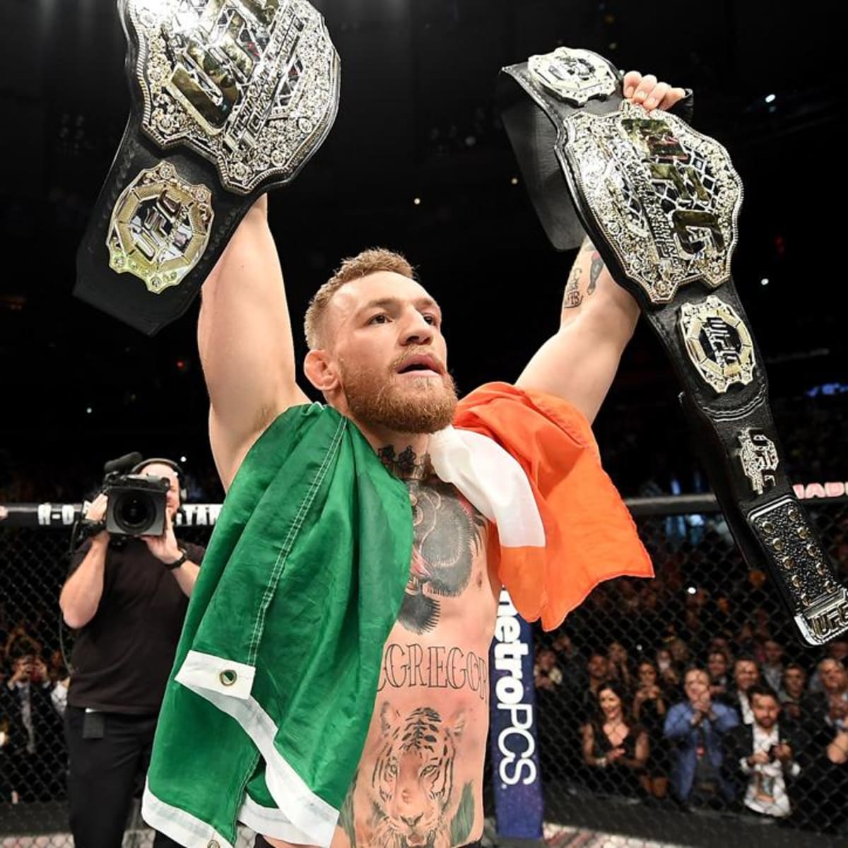 conor mcgregor two belts
