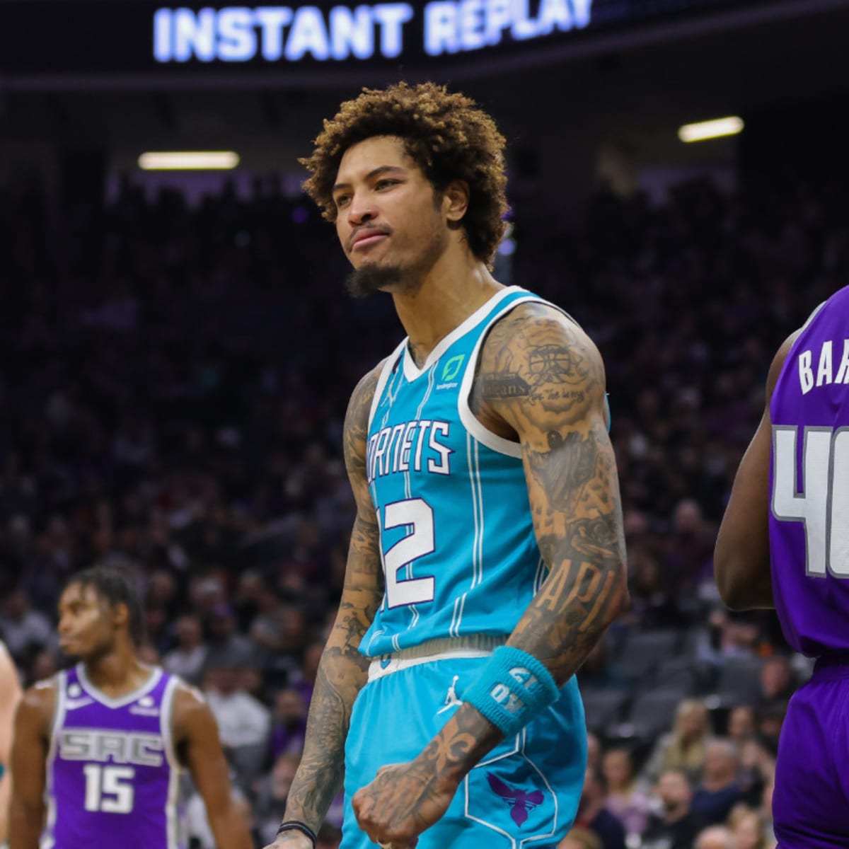 The tattooed hands of Charlotte Hornets guard Kelly Oubre Jr