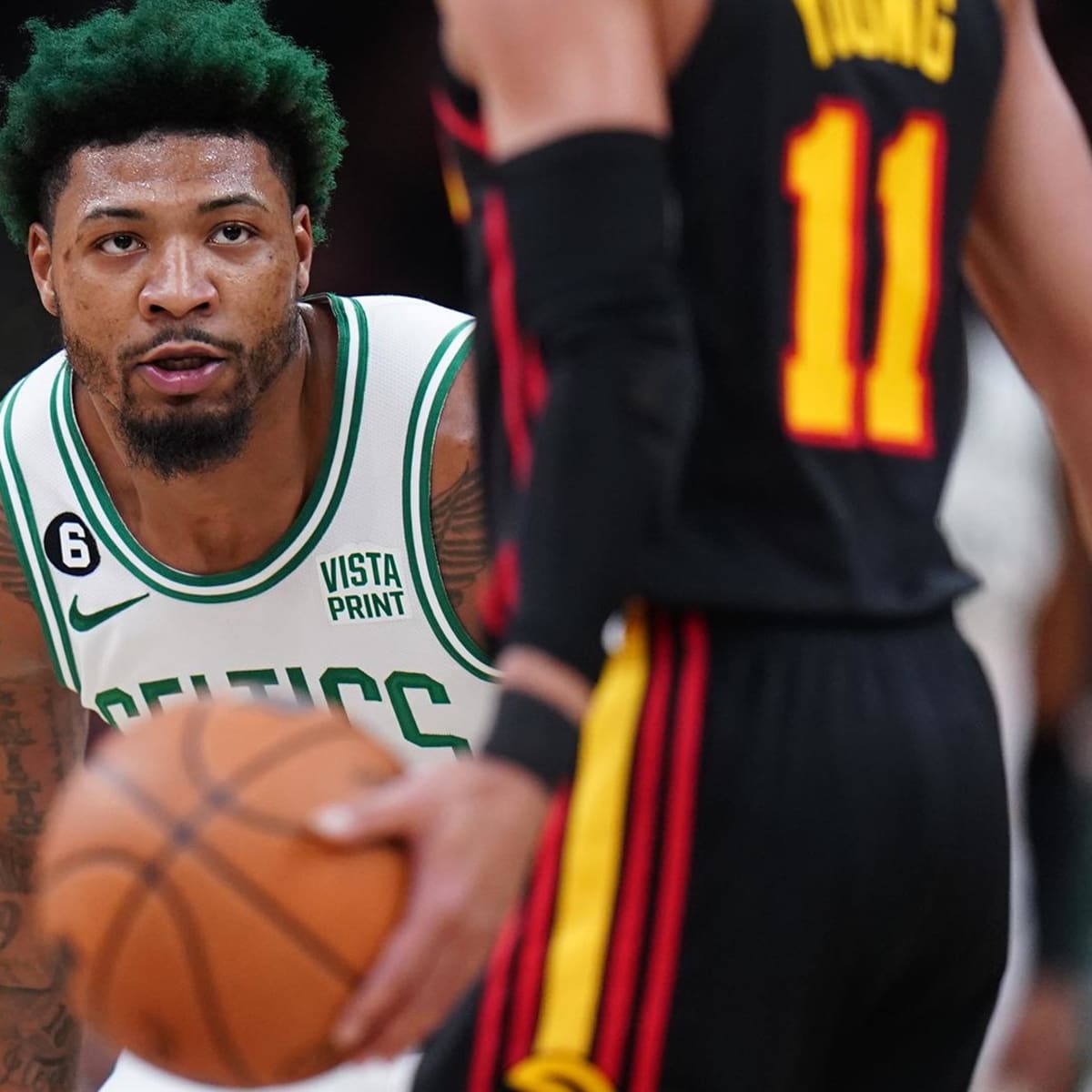 Celtics' Marcus Smart, Hawks' Trae Young get into wrestling match