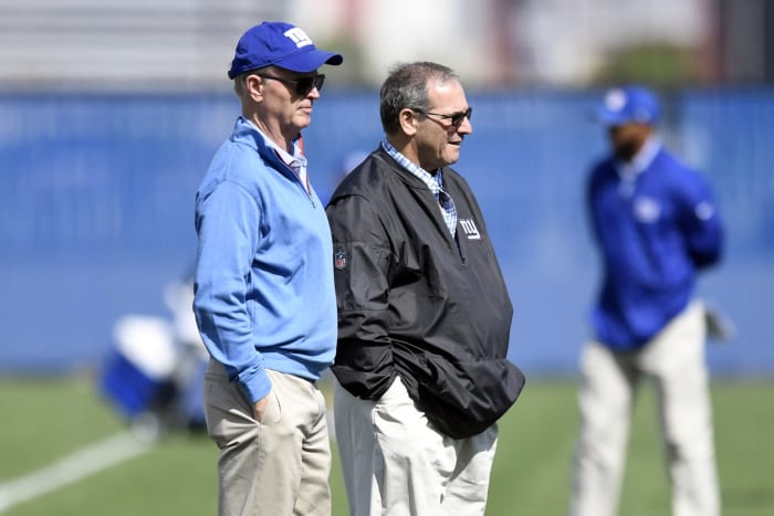 May 11, 2018; East Rutherford, NJ, USA; New York Giants owner John Mara (left) and general manager Dave Gettleman on the field during rookie minicamp at Quest Diagnostics Training Center on Friday.